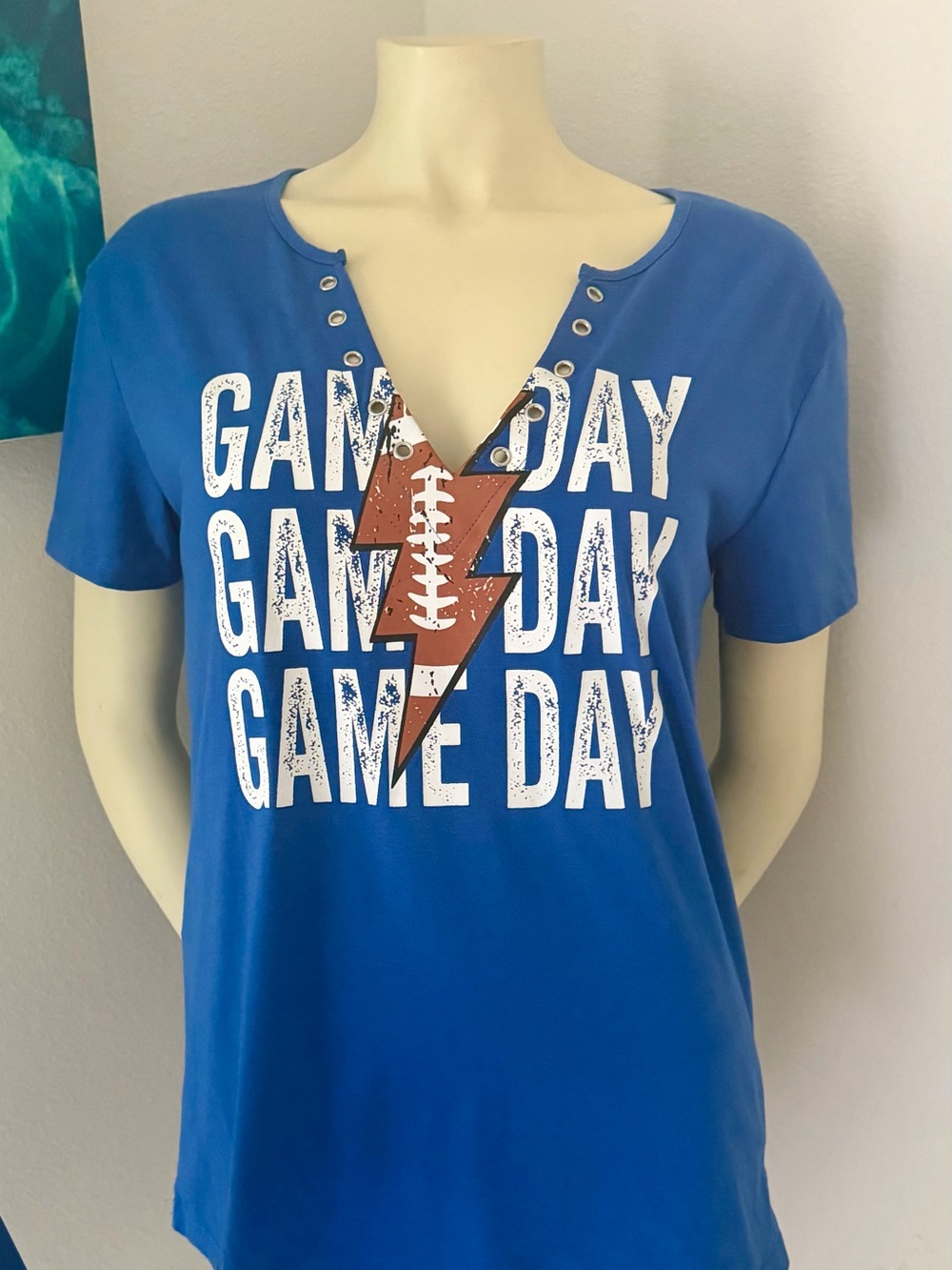 NBW! Game Day Women's Blue Graphic Tee with Football Lightning Design